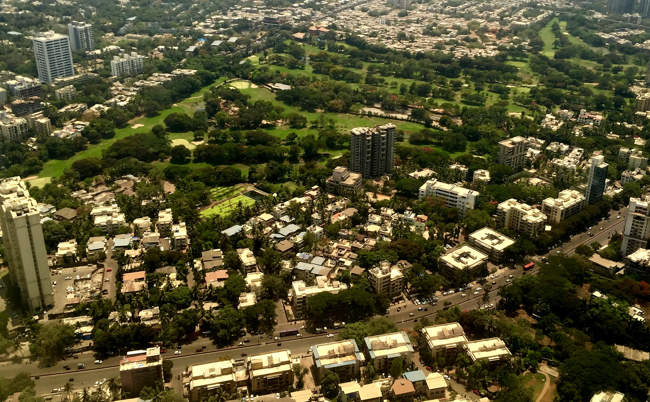 Aerial view of green open space surrounded by Mumbai neighbourhoods